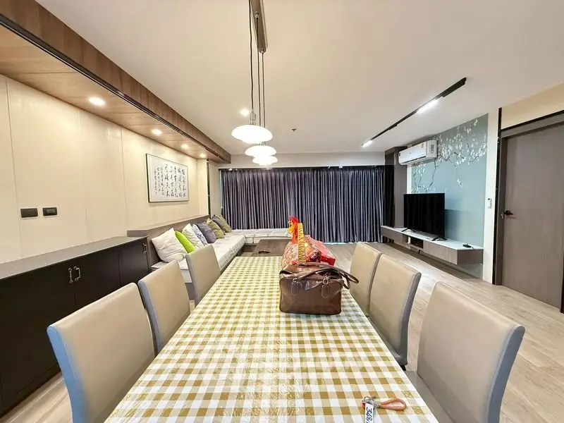 Spacious modern living room with elegant dining area and stylish decor