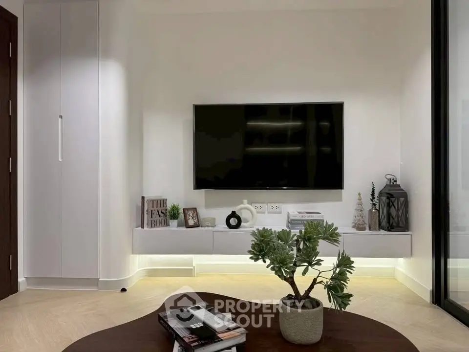 Modern living room with sleek TV setup and stylish decor