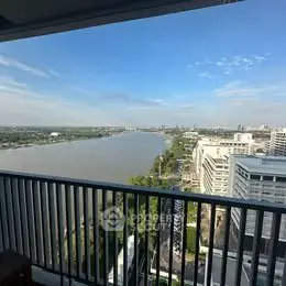 Stunning river view from high-rise balcony in urban setting