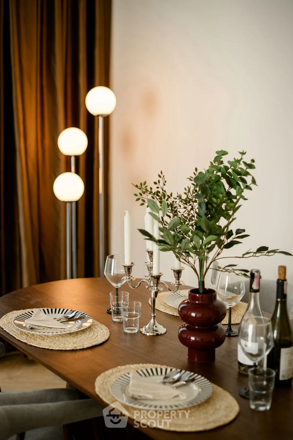 Elegant dining room setup with stylish decor and ambient lighting