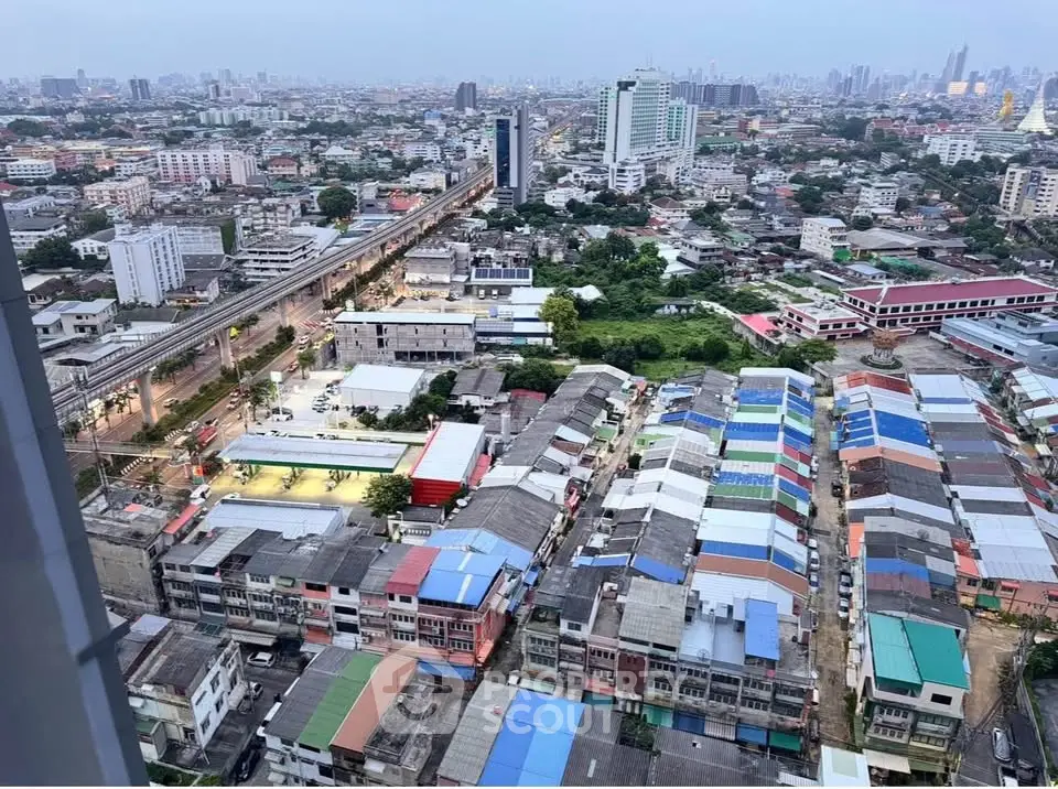 Stunning cityscape view from high-rise building showcasing vibrant urban landscape and skyline.