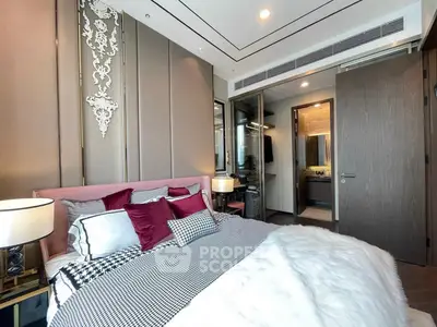 Luxurious bedroom with elegant decor and plush bedding in modern apartment