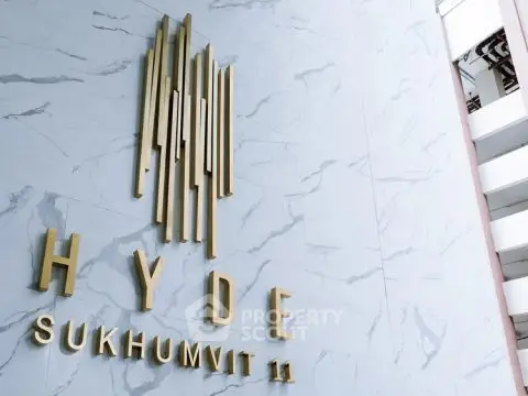 Elegant exterior of Hyde Sukhumvit 11 with modern architectural design.