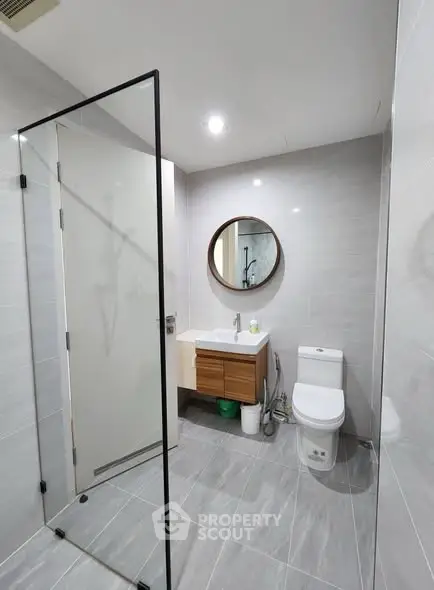 Modern bathroom with sleek design and glass shower enclosure