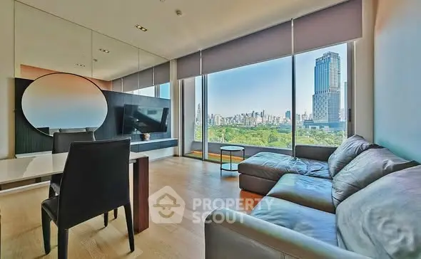 Luxurious living room with stunning city view and modern furnishings in high-rise apartment.