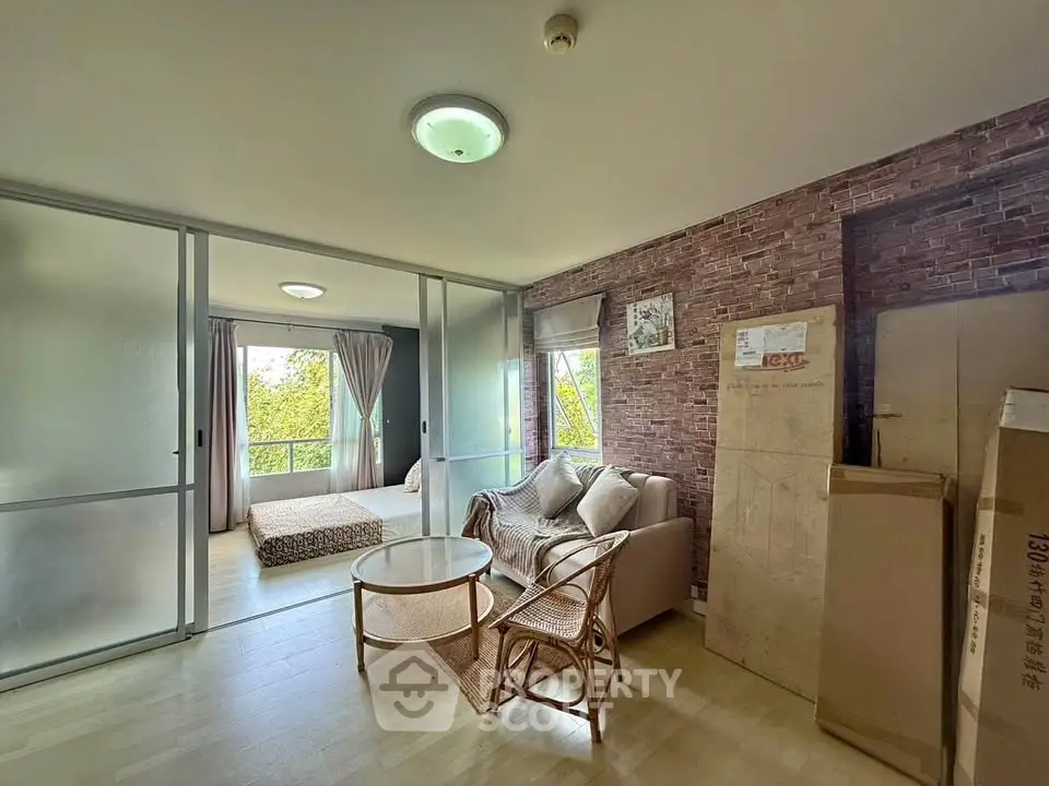 Cozy living room with glass sliding doors and natural light