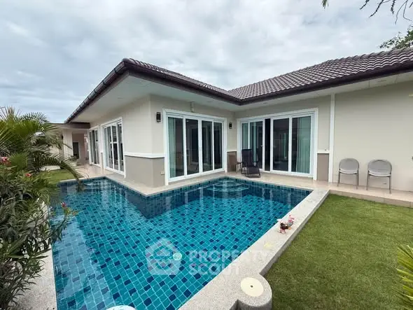 Luxurious villa with private pool and lush garden, perfect for serene living.