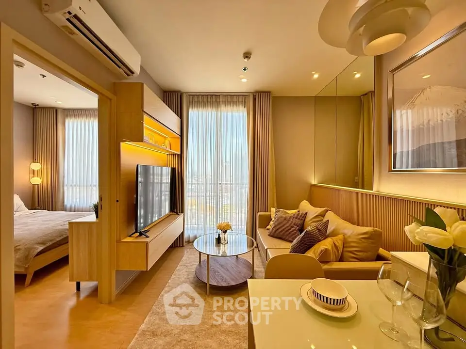 Modern living room with open layout, stylish decor, and natural light in a luxury apartment.