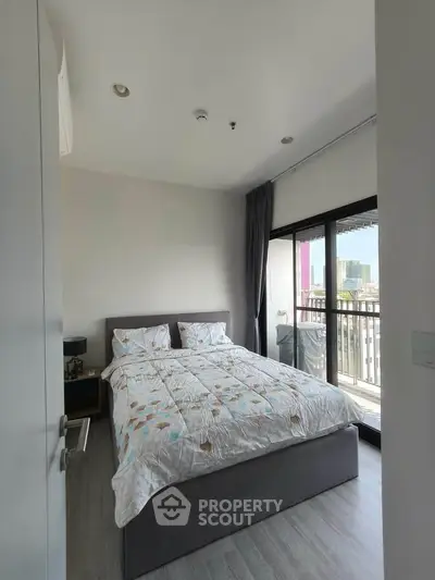 Modern bedroom with balcony view in a stylish apartment