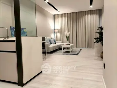 Modern living room with sleek design and cozy ambiance