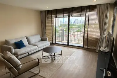 Modern living room with city view and stylish furniture