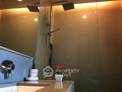 Modern bathroom with sleek fixtures and ambient lighting