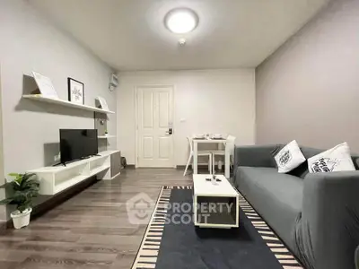 Modern living room with sleek furniture and stylish decor in a cozy apartment.