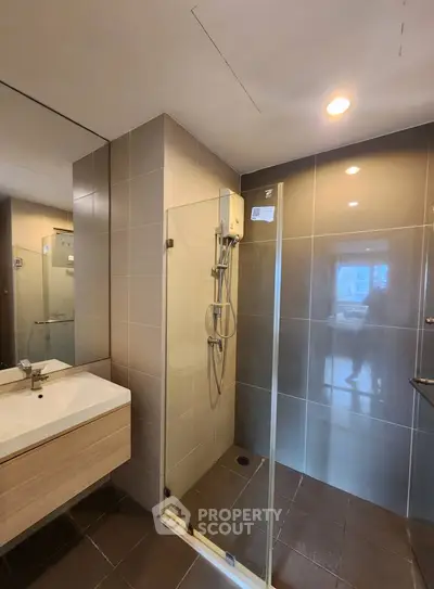 Modern bathroom with glass shower and sleek design
