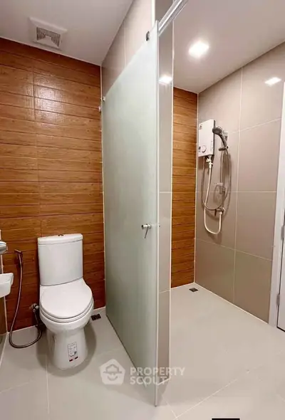 Modern bathroom with sleek design and glass shower partition