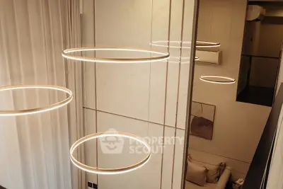 Modern interior with elegant circular lighting and stylish decor