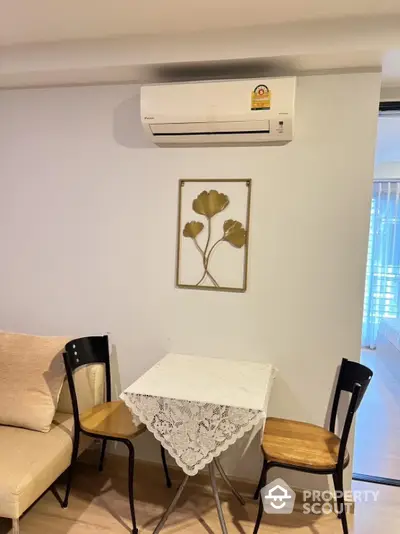 Cozy dining nook with air conditioning in modern apartment