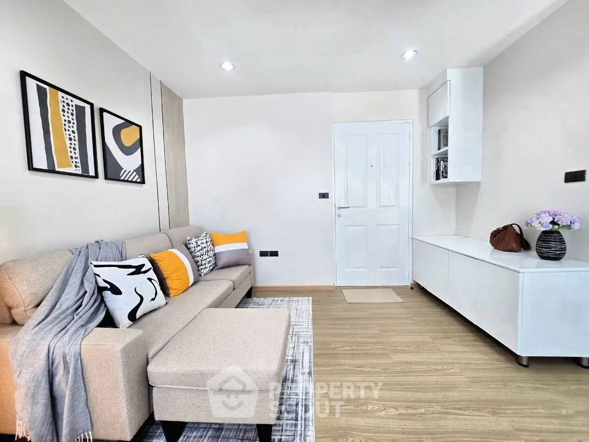 Modern living room with stylish decor and cozy seating area