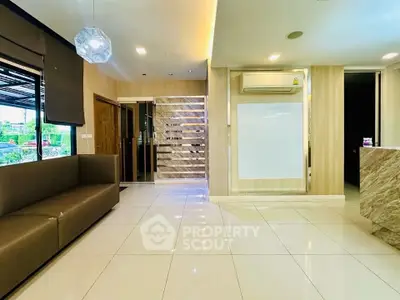 Modern living room with sleek design and air conditioning