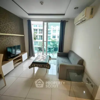 Modern living room with balcony view and stylish decor