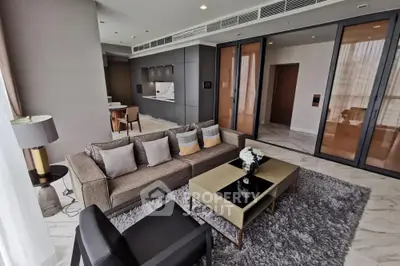 Luxurious modern living room with elegant decor and open kitchen layout