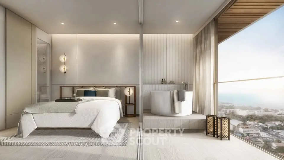 Luxurious bedroom with stunning ocean view and elegant bathtub