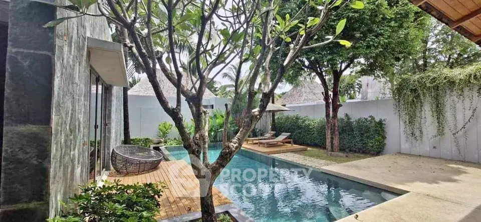 Luxurious villa with private pool and lush garden, perfect for relaxation and entertaining.