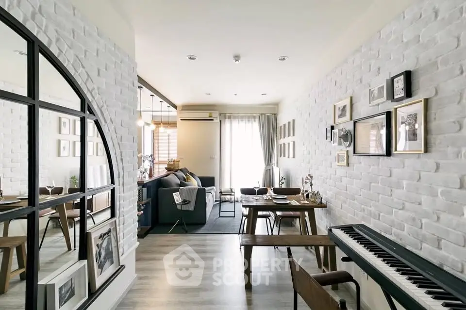 Stylish open-plan living and dining area with modern decor and natural light.