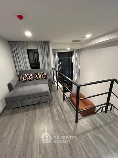 Modern loft interior with stylish furniture and city view, perfect for urban living.