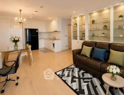 Spacious modern living room with elegant decor and open kitchen layout