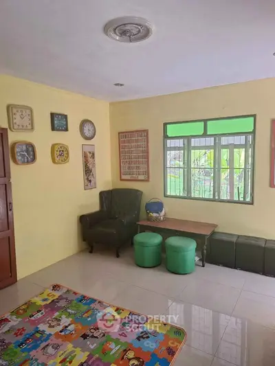 Cozy living room with colorful decor and comfortable seating