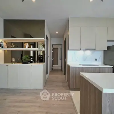 Modern kitchen with sleek cabinetry and open layout design