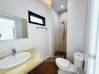 Modern bathroom with sleek fixtures and stylish tile design