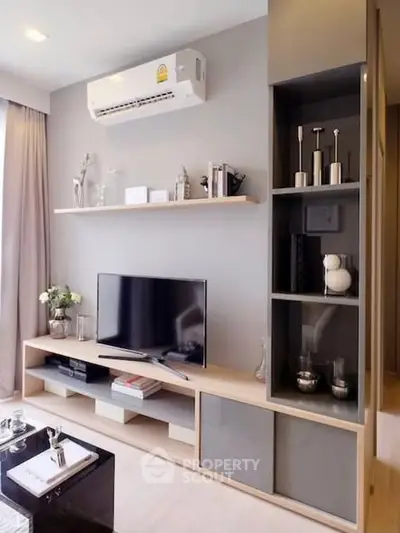 Modern living room with sleek TV unit and stylish decor