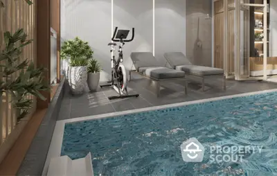 Luxurious indoor pool area with exercise bike and lounge chairs, perfect for relaxation and fitness.