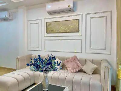 Elegant living room with plush sofa and modern decor