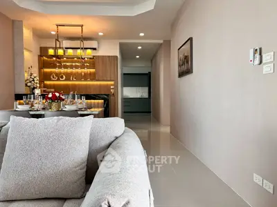 Modern living room with elegant dining area and stylish decor