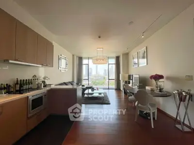 Luxurious open-plan living room with stunning city view and elegant decor