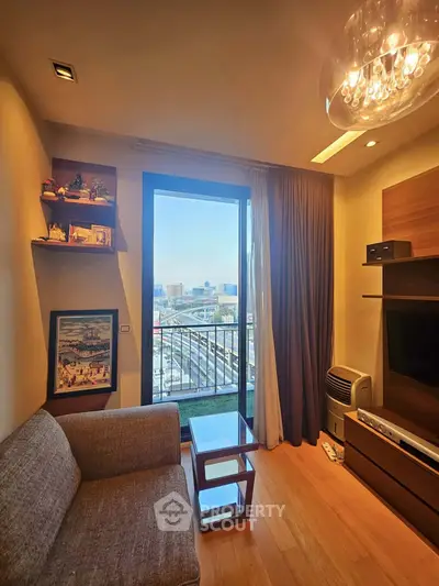 Chic living room with modern decor and stunning city view from balcony.