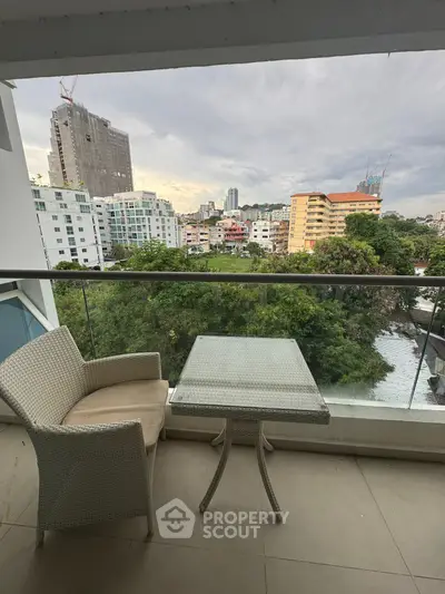 Charming balcony with city view, perfect for relaxing and enjoying the skyline.