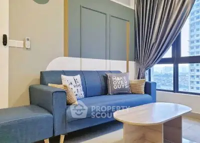 Modern living room with stylish blue sofa and city view window