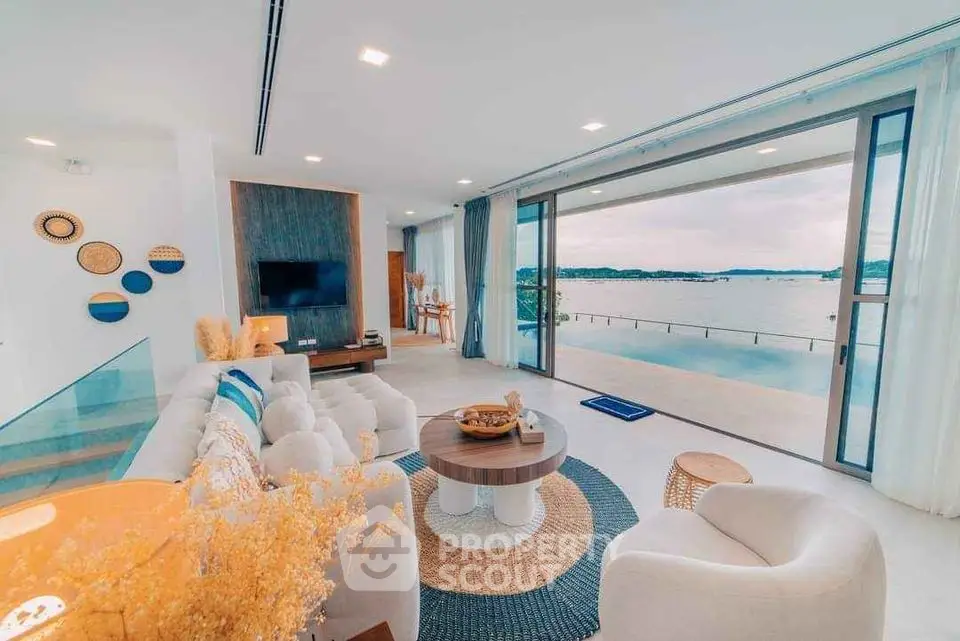 Luxurious living room with stunning waterfront view and modern decor