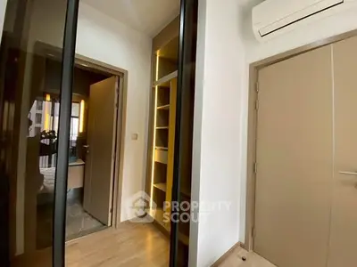 Modern apartment hallway with built-in storage and air conditioning