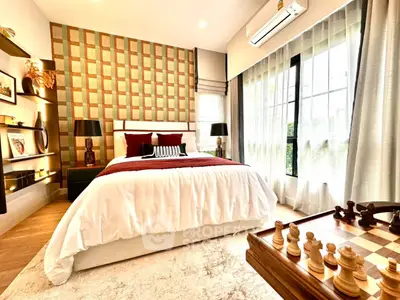 Luxurious bedroom with elegant decor and natural light