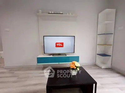 Modern living room with sleek TV setup and stylish decor