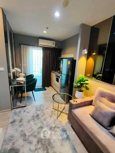 Modern living room with stylish decor and open kitchen layout