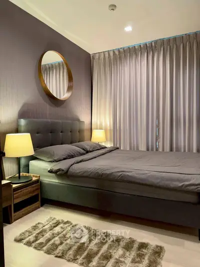 Cozy modern bedroom with elegant decor and ambient lighting