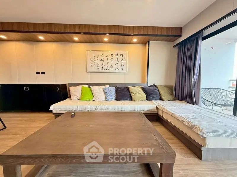 Spacious living room with cozy seating and modern decor