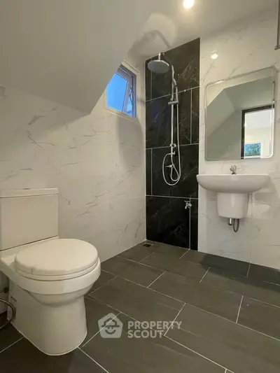 Modern bathroom with sleek fixtures and elegant tile design