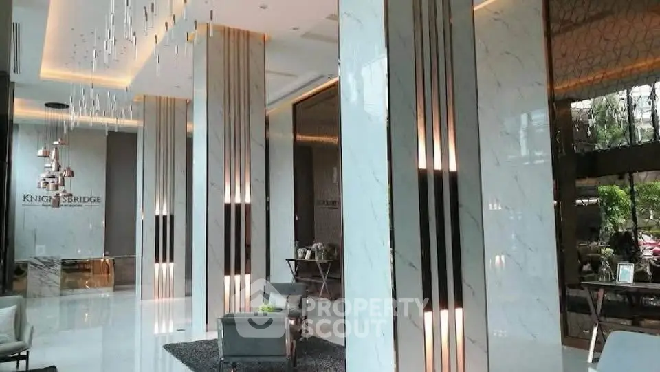 Luxurious modern building lobby with elegant lighting and marble finishes